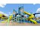 Playground with colorful slides, climbing structures, and shaded areas for fun and safety at 1142 Camden St, North Charleston, SC 29405