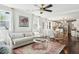 Spacious living room with an open layout, showcasing modern decor and seamless flow to the dining area at 115 Peachtree St, Charleston, SC 29403