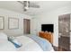 Bright bedroom featuring a wood dresser and views to a marble bath with glass-enclosed shower at 115 Peachtree St, Charleston, SC 29403