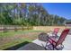 Backyard with patio featuring outdoor seating and a privacy fence at 117 Camellia Bloom Dr, Moncks Corner, SC 29461