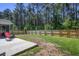 Spacious backyard with a wooden privacy fence and grassy area at 117 Camellia Bloom Dr, Moncks Corner, SC 29461
