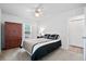 Cozy bedroom features neutral tones, a ceiling fan, and built-in storage at 119 Savannah Round, Summerville, SC 29485