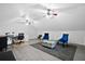 Bright bonus room with multiple ceiling fans, sitting area, and a work station at 119 Savannah Round, Summerville, SC 29485