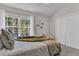 Bright bedroom with plush bedding, a large window, and ample closet space at 122 Brockman Way, Goose Creek, SC 29445