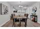 Dining room featuring a stylish table set, decor and an open concept layout at 122 Brockman Way, Goose Creek, SC 29445