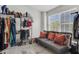 Bright dressing room with expansive wardrobe rack and comfortable seating at 122 Brockman Way, Goose Creek, SC 29445