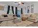 Cozy living room with a large rug, contemporary furniture, and lots of natural light at 122 Brockman Way, Goose Creek, SC 29445