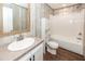 A bathroom featuring wood-look floors, vanity, toilet, and tub-shower combo at 1330 Whitehouse Rd, Summerville, SC 29486