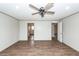 Spacious bedroom with an ensuite bathroom and wood-look floors at 1330 Whitehouse Rd, Summerville, SC 29486