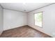 Bright bedroom with hardwood floors and a window offering a natural view at 1330 Whitehouse Rd, Summerville, SC 29486