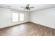 Inviting bedroom with wood-look floors and bright natural light at 1330 Whitehouse Rd, Summerville, SC 29486