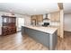 Well-equipped kitchen featuring a central island, ample counter space, and modern wood cabinets for storage at 1330 Whitehouse Rd, Summerville, SC 29486