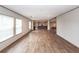 Expansive living room with hardwood floors and natural light, seamlessly connecting to kitchen and entertainment areas at 1330 Whitehouse Rd, Summerville, SC 29486