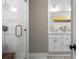 Bathroom featuring a frameless glass shower and double sink vanity at 1500 Trumpet Vine Ct, Mount Pleasant, SC 29464