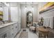 Bathroom featuring a vanity with storage and an decorative chair at 1500 Trumpet Vine Ct, Mount Pleasant, SC 29464