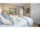 Comfortable bedroom featuring a bed with plush pillows, natural light, and elegant decor at 1500 Trumpet Vine Ct, Mount Pleasant, SC 29464