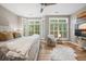Sun-filled main bedroom with a sitting area and windows with plantation shutters at 1500 Trumpet Vine Ct, Mount Pleasant, SC 29464