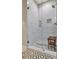 Modern bathroom shower with glass enclosure, detailed tile, and a built-in seat at 1500 Trumpet Vine Ct, Mount Pleasant, SC 29464
