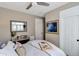 Inviting bedroom featuring a ceiling fan, a cozy bed, and neutral walls, creating a relaxing atmosphere at 1500 Trumpet Vine Ct, Mount Pleasant, SC 29464