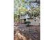 View of the home's exterior with a balcony surrounded by mature trees at 1500 Trumpet Vine Ct, Mount Pleasant, SC 29464