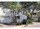 Charming two-story home with stairs to front door and garage at 1500 Trumpet Vine Ct, Mount Pleasant, SC 29464