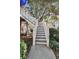 Inviting townhouse entryway with white picket fence leading to the front door, showcasing curb appeal at 1500 Trumpet Vine Ct, Mount Pleasant, SC 29464