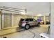 Garage featuring electric vehicle charging station and gray SUV at 1500 Trumpet Vine Ct, Mount Pleasant, SC 29464