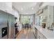 Eat-in kitchen featuring stainless steel appliances, white cabinets, and a breakfast nook at 1500 Trumpet Vine Ct, Mount Pleasant, SC 29464