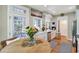 Bright kitchen with wood floors, modern appliances and access to the outdoor balcony at 1500 Trumpet Vine Ct, Mount Pleasant, SC 29464