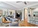 Spacious living room with hardwood floors and an open floor plan to the kitchen at 1500 Trumpet Vine Ct, Mount Pleasant, SC 29464
