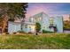 Spacious backyard featuring well-maintained lawn, lush greenery, shed and a charming exterior staircase at 154 Wentworth St, Charleston, SC 29401