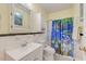 Bathroom with tile floor, bath and shower, single sink at 154 Wentworth St, Charleston, SC 29401