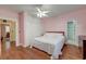 Bedroom with a queen-size bed, closet space, and access to other rooms at 154 Wentworth St, Charleston, SC 29401