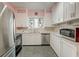 Kitchen with stainless steel appliances, light cabinetry, and bright countertop at 154 Wentworth St, Charleston, SC 29401