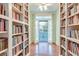 Library with hardwood floors, ceiling fan and lots of bookshelves at 154 Wentworth St, Charleston, SC 29401