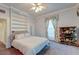 Calm main bedroom with soft lighting, a decorative window, and comfortable, neutral furnishings at 154 Wentworth St, Charleston, SC 29401