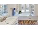 Bathroom features double vanity, soaking tub, decor and natural light at 1576 Pine Grove Rd, Ruffin, SC 29475