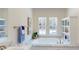 Bright bathroom features a built in shelving unit and a soaking tub at 1576 Pine Grove Rd, Ruffin, SC 29475