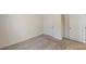 Bright bedroom with neutral carpet, white walls and white doors at 1576 Pine Grove Rd, Ruffin, SC 29475