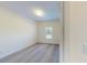 Bright bedroom with neutral carpet, white walls and a large window at 1576 Pine Grove Rd, Ruffin, SC 29475
