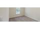 Neutral bedroom has a large window that provides natural light at 1576 Pine Grove Rd, Ruffin, SC 29475