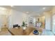 Elegant dining area with natural light and a view into the living spaces at 1576 Pine Grove Rd, Ruffin, SC 29475