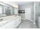 Bathroom with granite counters, double vanity, tiled floor and large mirror at 158 Boots Branch Rd, Summerville, SC 29485