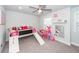 Bedroom features neutral carpet, a toddler bed with slide, and cute decor at 158 Boots Branch Rd, Summerville, SC 29485