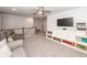 Bonus room featuring carpet flooring, white storage cabinets, and staircase access at 158 Boots Branch Rd, Summerville, SC 29485