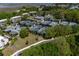 Overhead shot of community tennis courts surrounded by trees and residential buildings at 160 High Hammock Villas, Seabrook Island, SC 29455