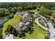 Community clubhouse featuring an outdoor pool and meticulous landscaping at 160 High Hammock Villas, Seabrook Island, SC 29455