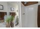 Bathroom showcasing a shower and a large mirror wall with decorative fixtures at 160 High Hammock Villas, Seabrook Island, SC 29455
