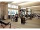 Well-equipped fitness center with lake views, offering a variety of modern exercise machines at 160 High Hammock Villas, Seabrook Island, SC 29455
