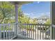 Balcony with views of the neighborhood and surrounding greenery, perfect for relaxing at 1637 Folly Creek Way # E-12, Charleston, SC 29412